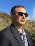 photo of Darryl Caterine with sunglasses on, outdoors