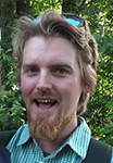 Headshot of Jack Hunter with trees in the background