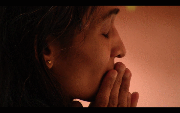 Close up shot of woman in prayer